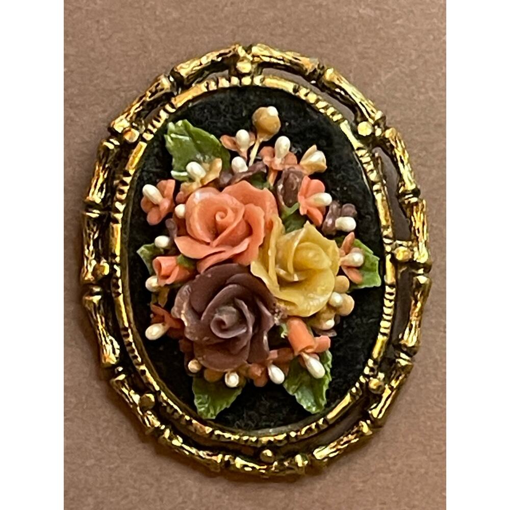 Vintage GILDA Floral Cameo Brooch 3D Carved Roses Gold Frame Black Background